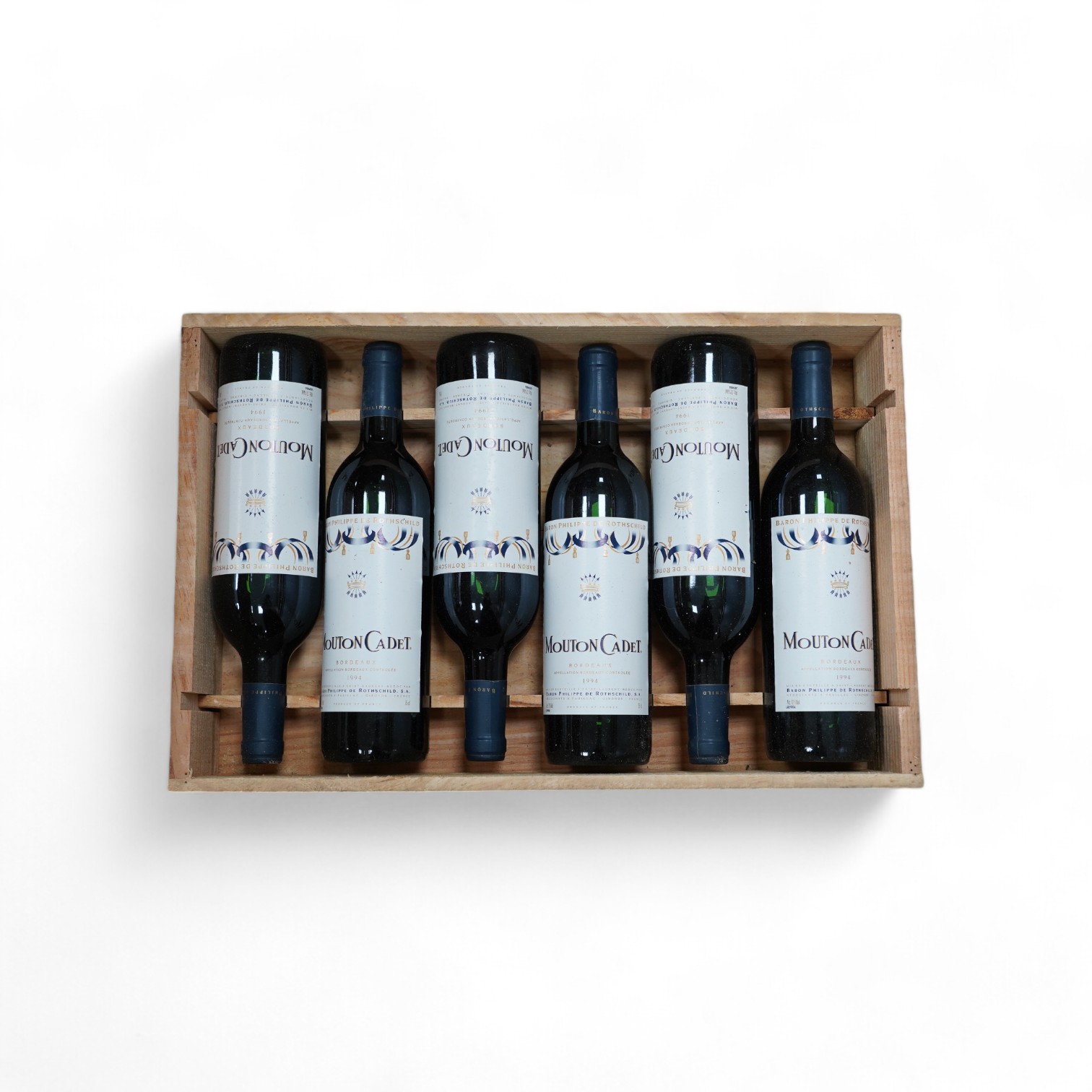 A case of six bottles of Mouton Cadet Bordeaux 1994. Condition - storage unknown